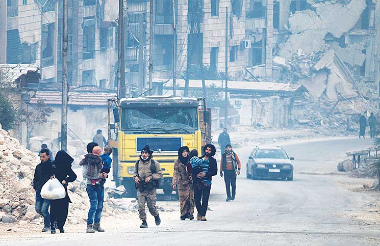 مليشيات شيعية تنفذ إعدامات ميدانية في حلب ومجزرة كيماوية في حماة